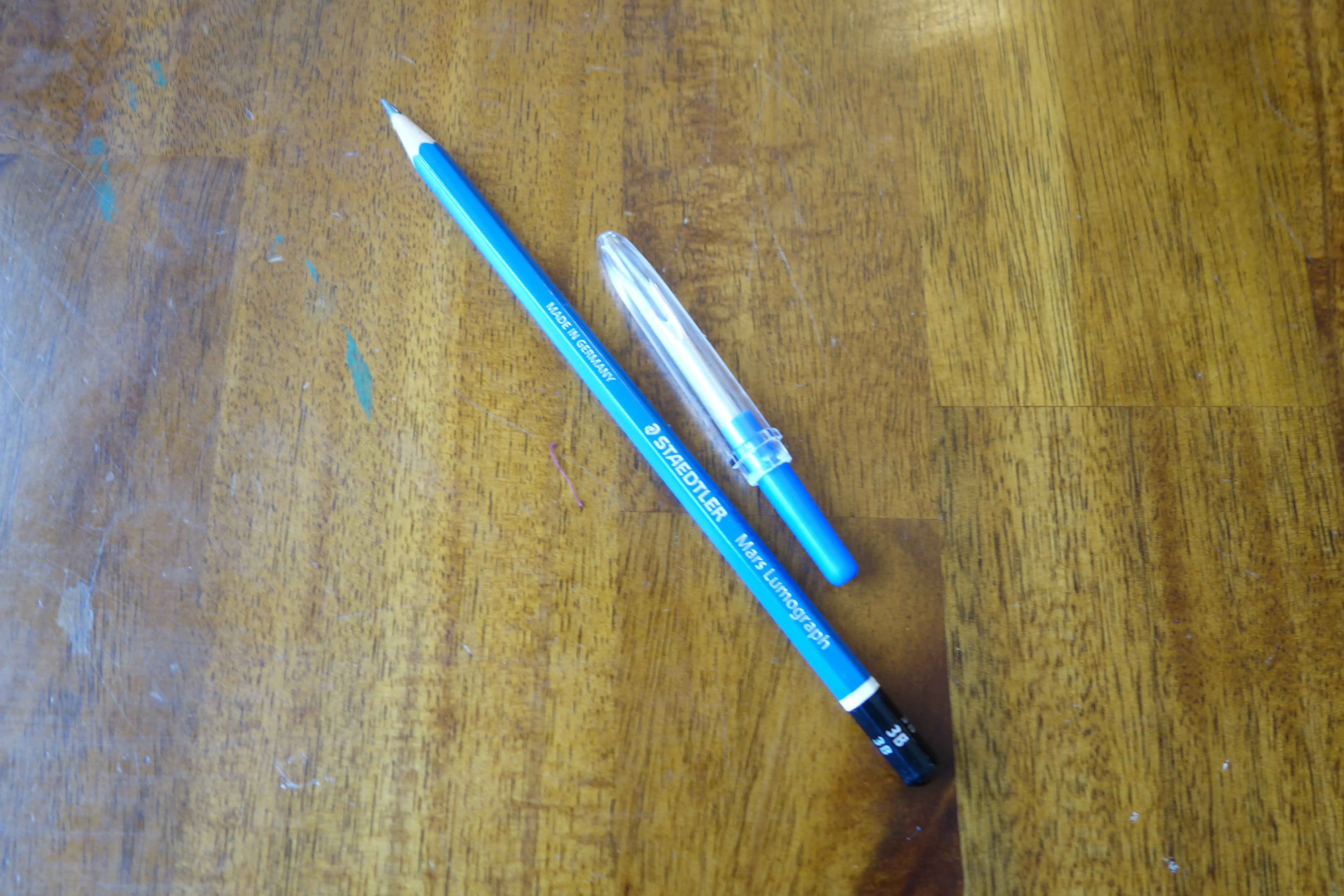 a seam ripper and a 3B graphite pencil